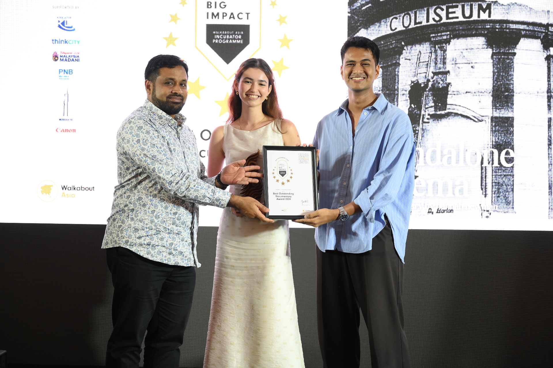 Hannah Newman receiving the SSBI 2024 Best Outstanding Documentary Award for When the Coliseum Sang.